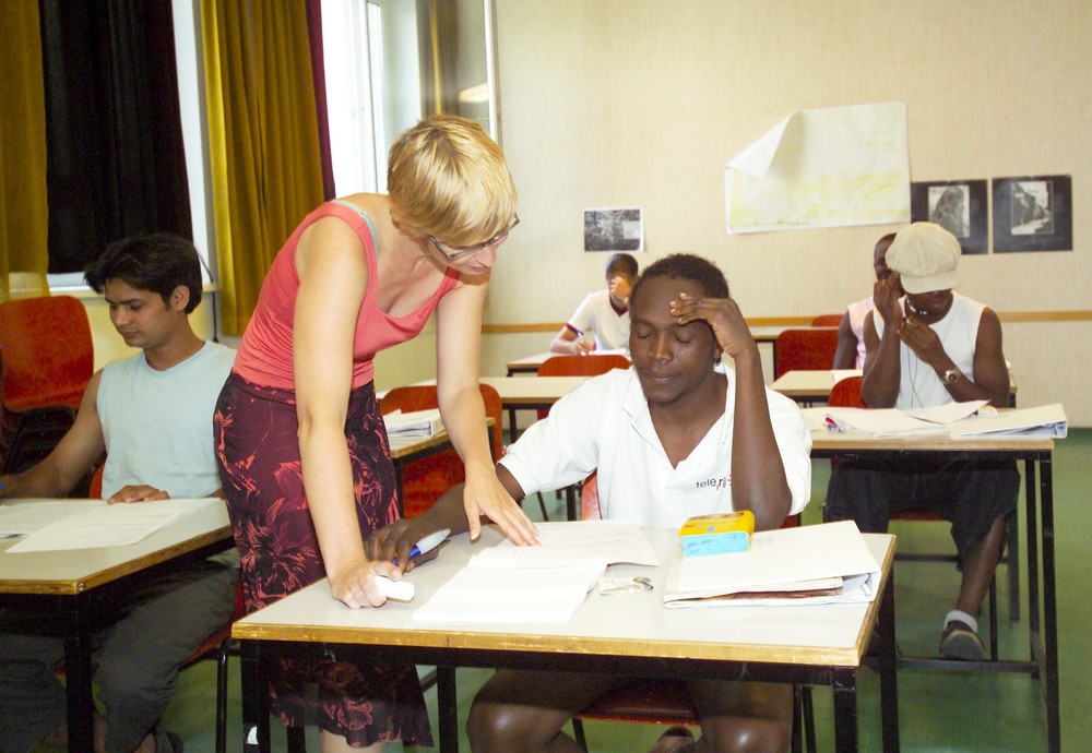 Flüchtlinge beim Sprachunterricht / kathbild.at/Rupprecht